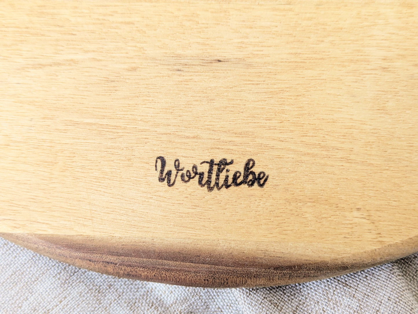 Rundes Holzbrett „Schmeckt und seht“